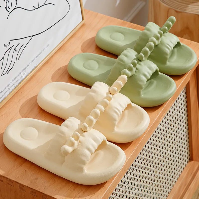 Deer horn design EVA flip flop slippers in light yellow on a non-slip sole.