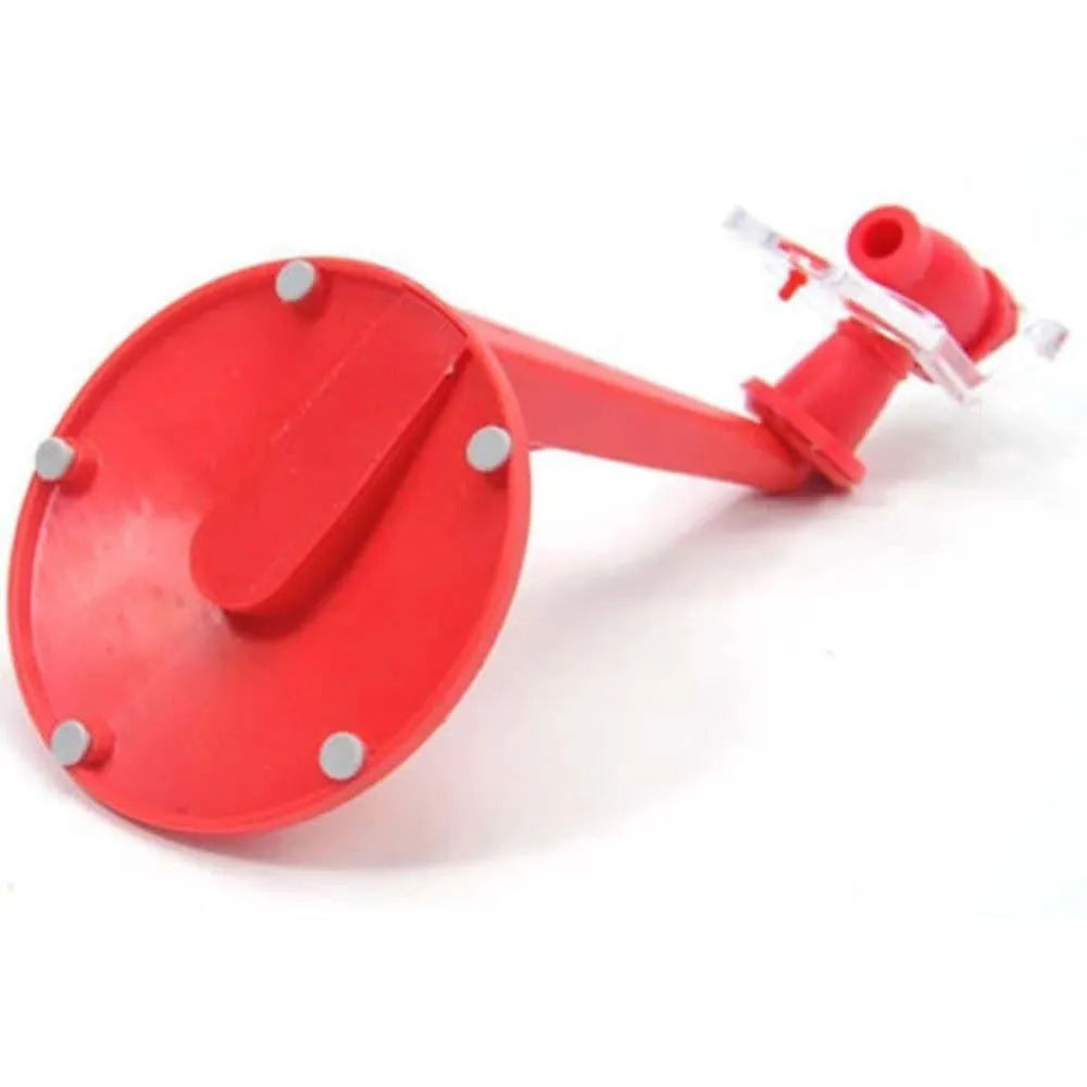 Red plastic Magic Tap soda drink dispenser attached to an inverted 2-litre bottle.