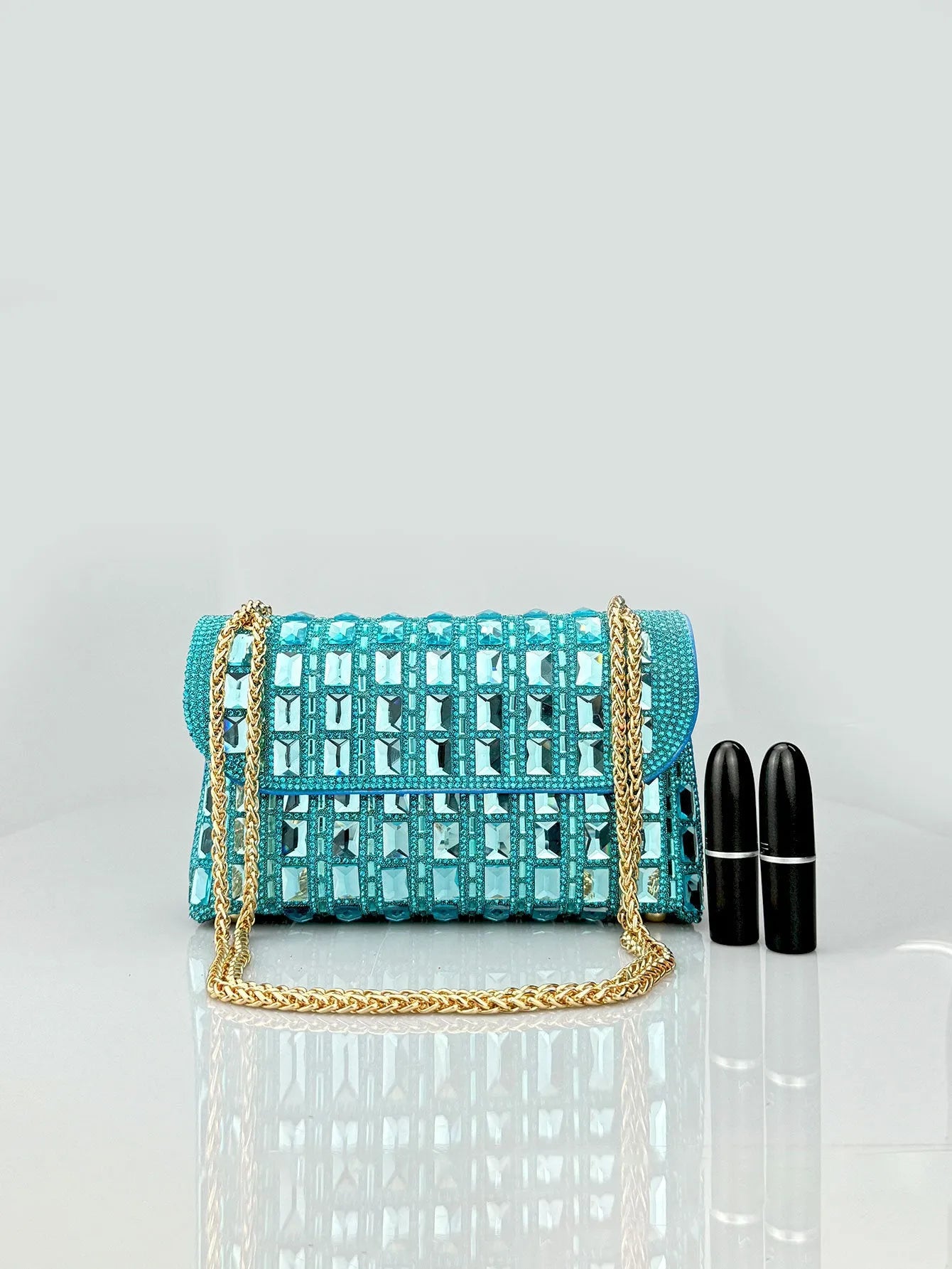 Glass rhinestone chain clutch handbag in horizontal square shape with retro styling and chain strap