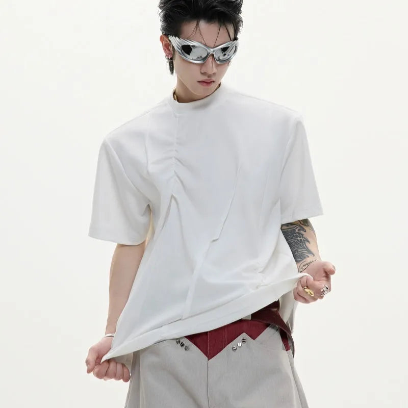 Men's loose fit cotton T-shirt in black with 3D pleated detail and round neck.