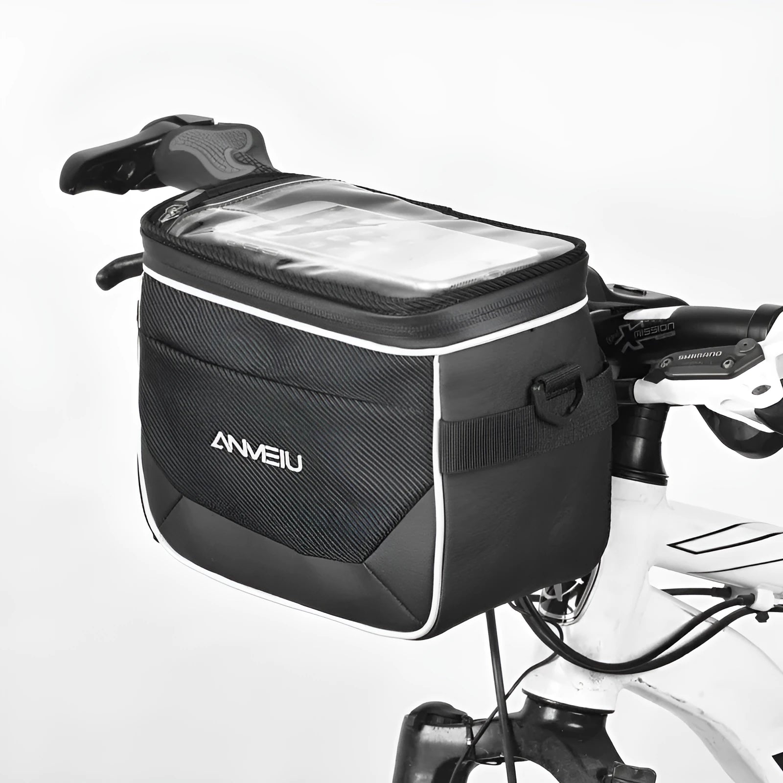 Black folding bicycle bag with hanging strap attached to handlebars