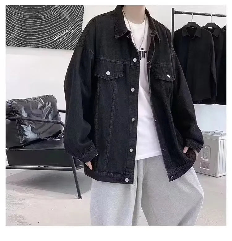 Loose-fitting denim jacket in dark blue, light blue, or black with long sleeves and straight hem, sizes M-3XL