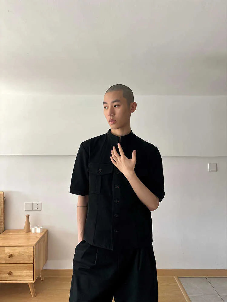Handmade black half sleeve men's shirt with a shirt collar and loose fit for casual hunting wear.