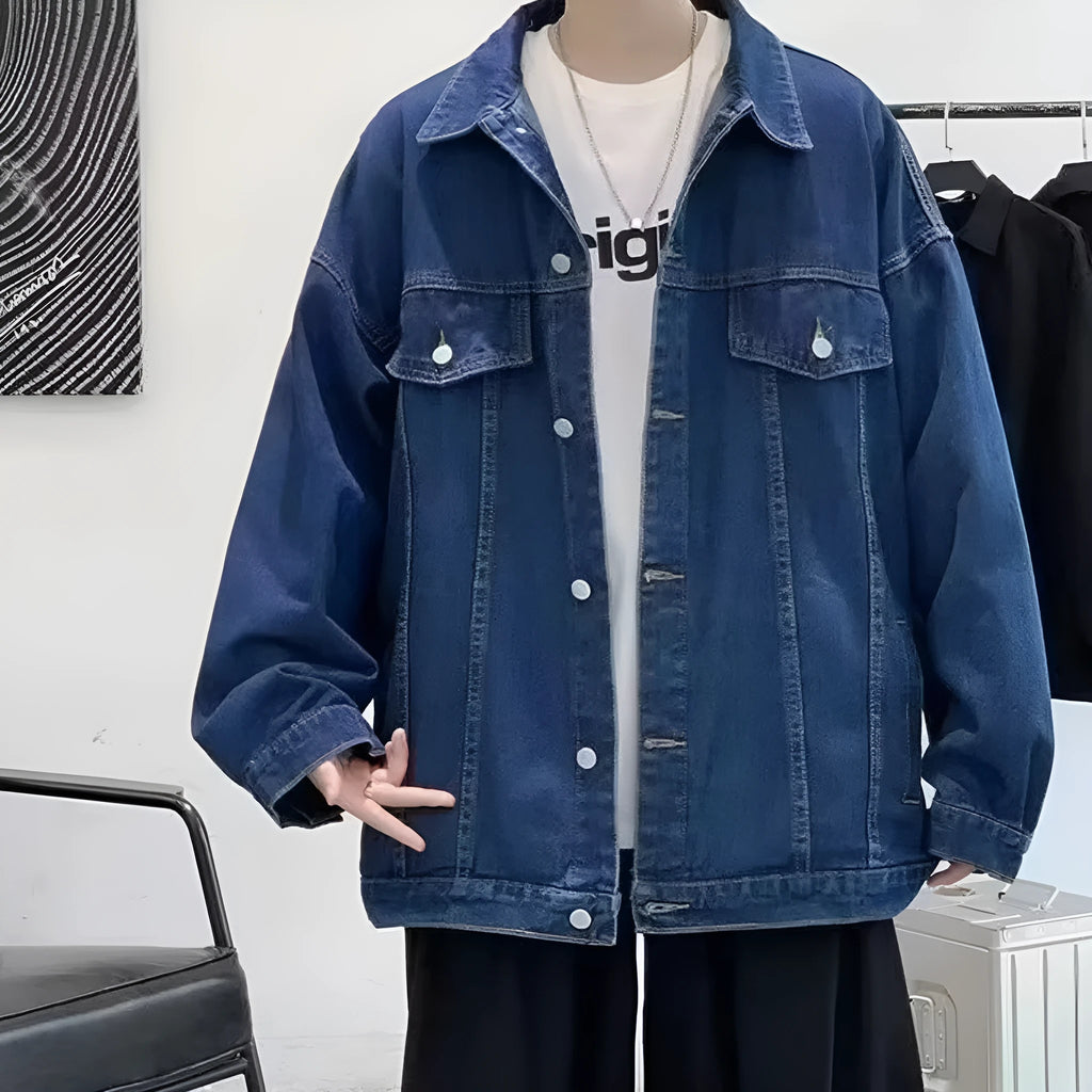 Loose-fitting denim jacket in dark blue, light blue, or black with long sleeves and straight hem, sizes M-3XL