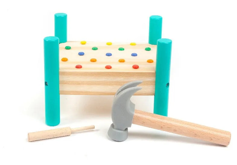 Wooden knock table with 17 colourful nails, hammer and reverse knock on khaki wood base