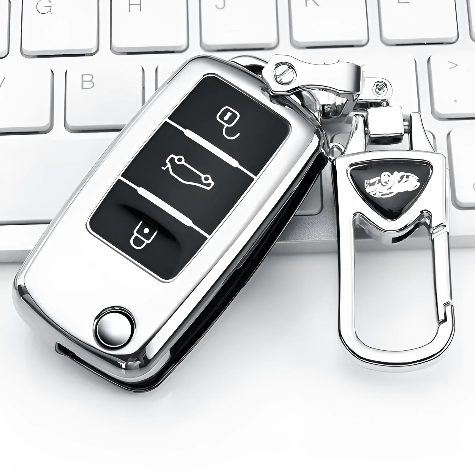 VW Model A folding car key with a blue TPU protective case fitted over the remote fob.
