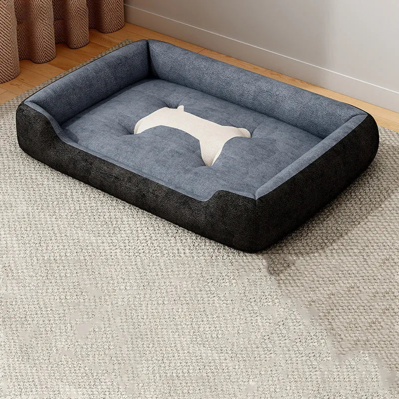A soft, padded pet sofa mat shown in one of five colours (Black, Grey, Red, Yellow) next to a dog, illustrating its use as a furniture-protecting bed.