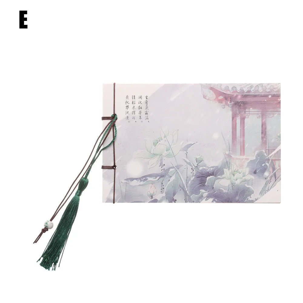 Hand-stitched kraft paper notebook with a tassel bookmark, shown in a natural colour.