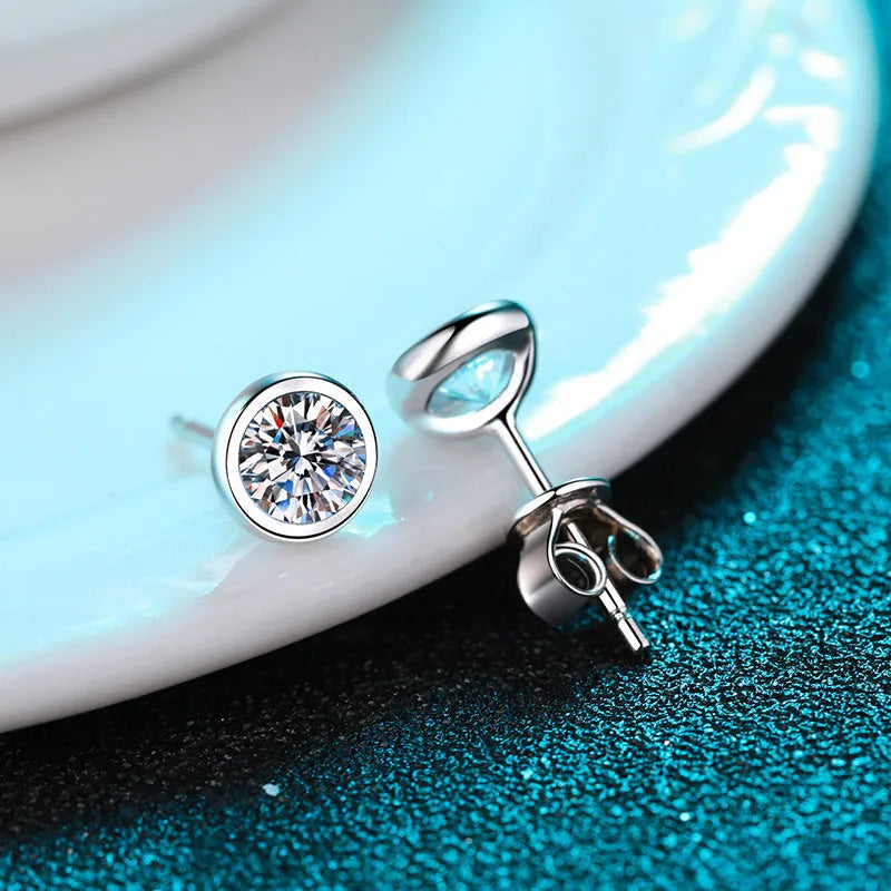 Geometric gold plated women's earrings with a moissanite stone on a 925 silver setting.
