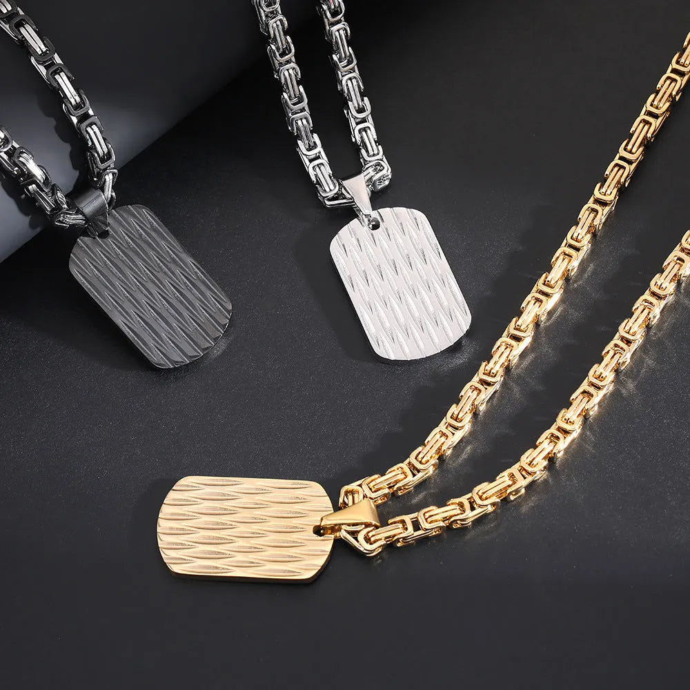 Men's titanium steel water ripple geometric pendant necklace on Emperor Chain in black, gold, or silver.