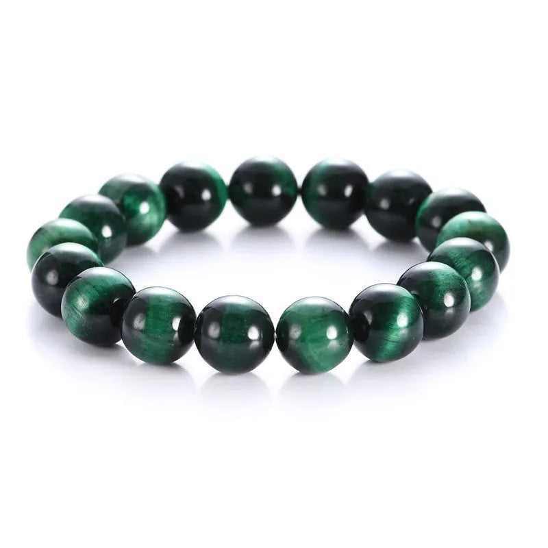 Green Tiger Eye stone bracelet with polished geometric beads in various sizes
