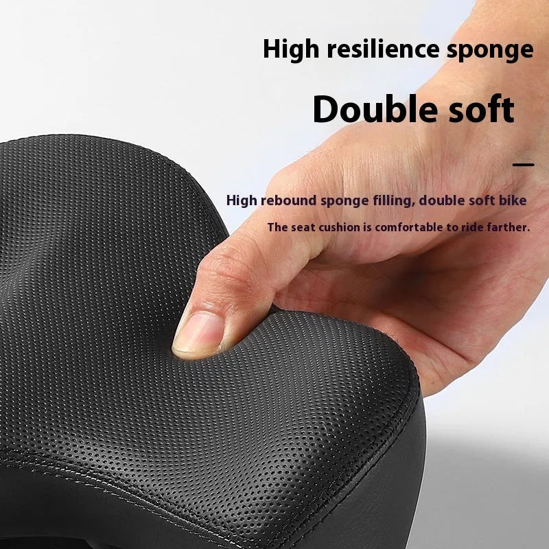 Black leather bicycle saddle cushion with thick foam padding for mountain bikes.