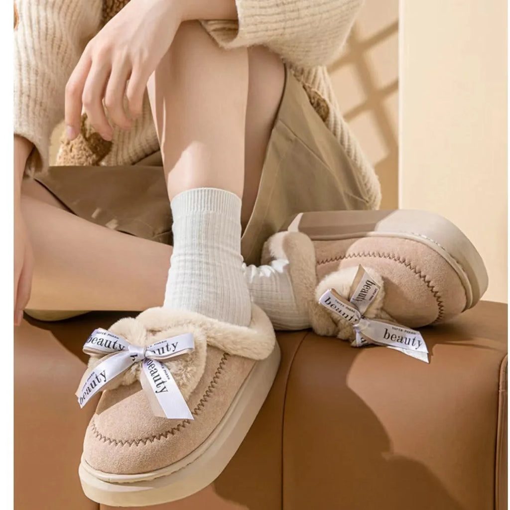 Beige suede women's half slippers with a ribbon bow and thick EVA sole.