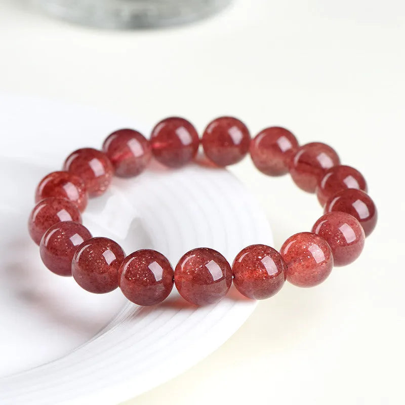 Natural strawberry quartz crystal bracelet with cherry red colour and geometric beads
