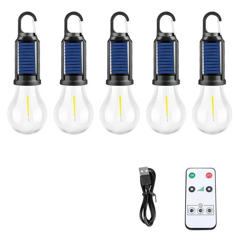 Five solar-powered warm white LED lantern-style light bulbs for outdoor garden use.