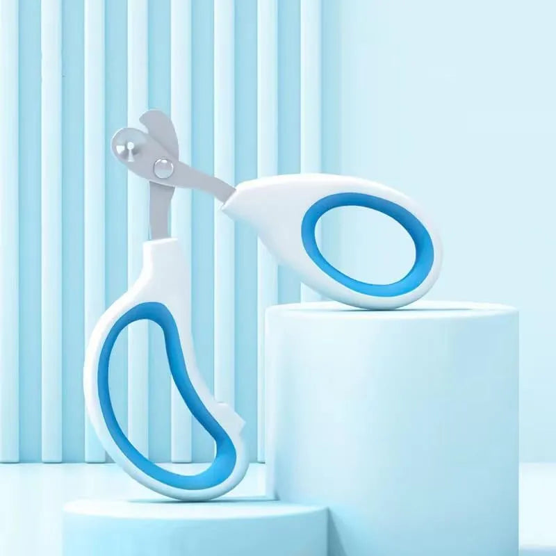 Blue cat nail clippers with circular cut hole design and cushioned non-slip handles.