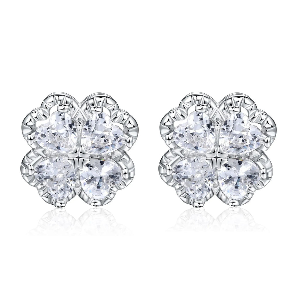 A pair of 925 silver four-leaf clover earrings with zircon stones in a heart-shaped setting.