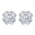 A pair of 925 silver four-leaf clover earrings with zircon stones in a heart-shaped setting.