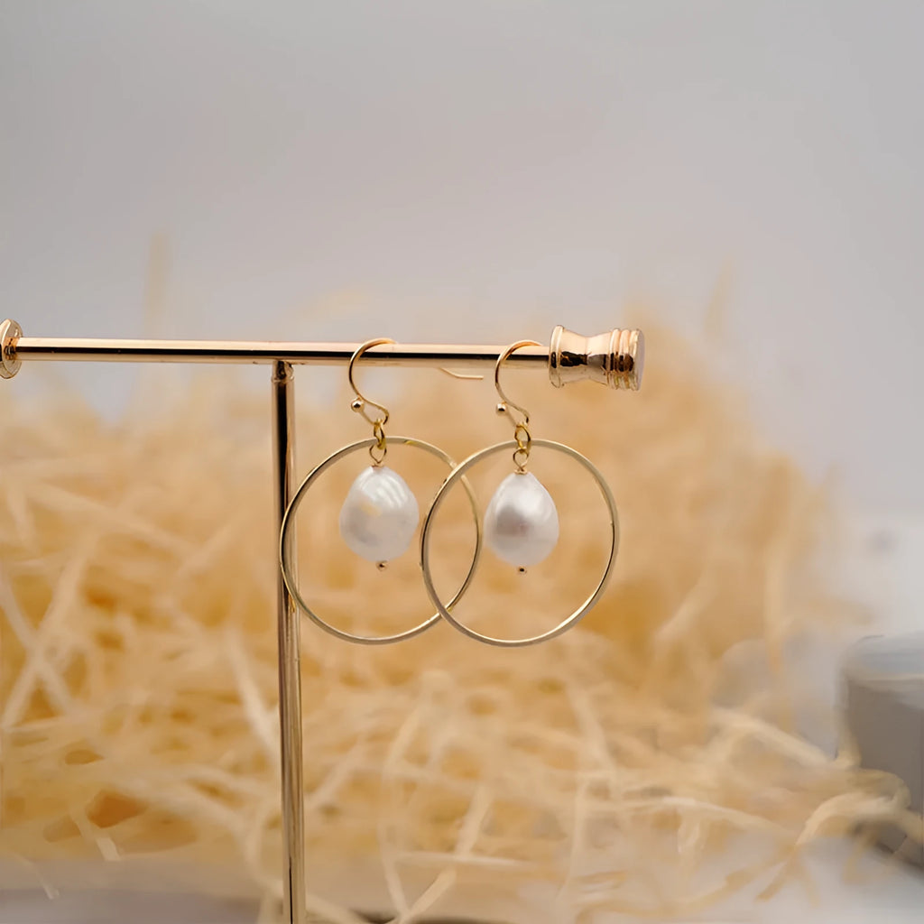 Baroque large circle shaped pearl earrings in simple geometric style for women