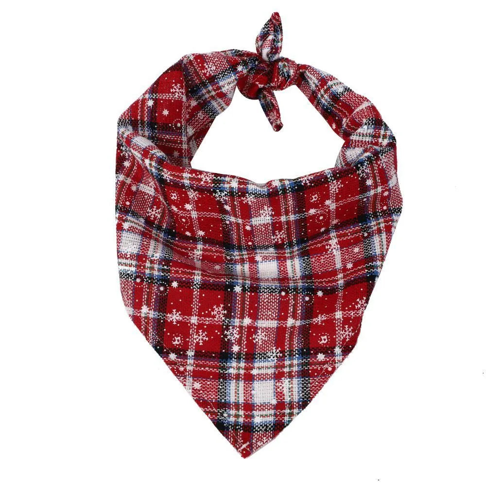 Red plaid Christmas triangle pet towel with embossed pattern, measuring 60x45cm, tied around a dog's neck.