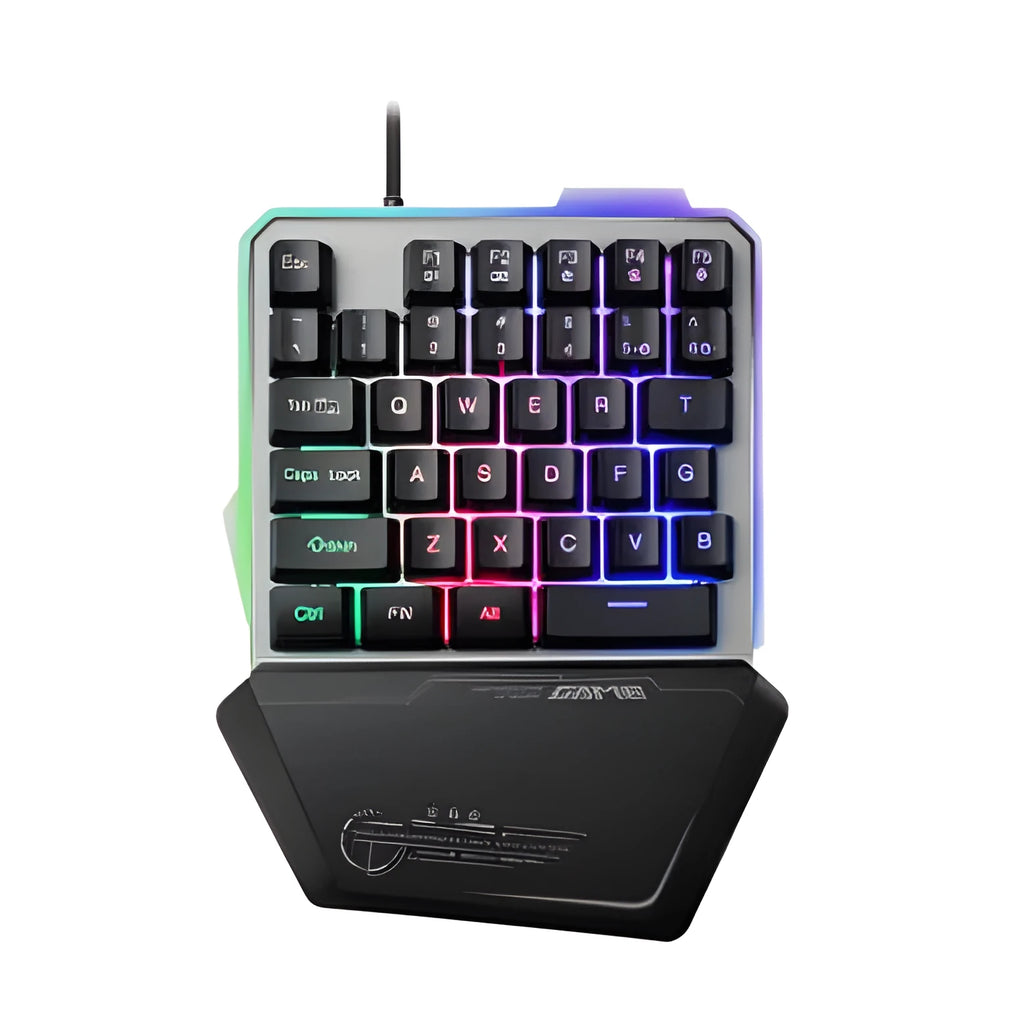 Black G40 Flow one-handed mechanical keyboard with RGB backlit keys on a desk.