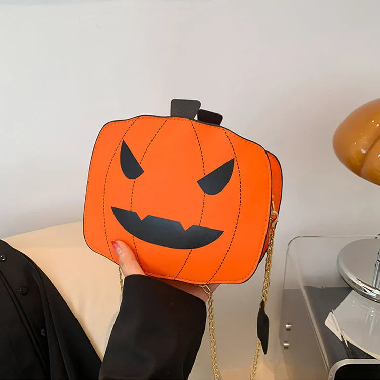Halloween cartoon pumpkin shoulder bag for girls in colour options with chain crossbody strap on white background