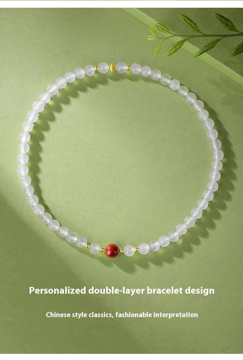 Women's white agate double layer bracelet with jequirity bean cinnabar detailing and geometric beads