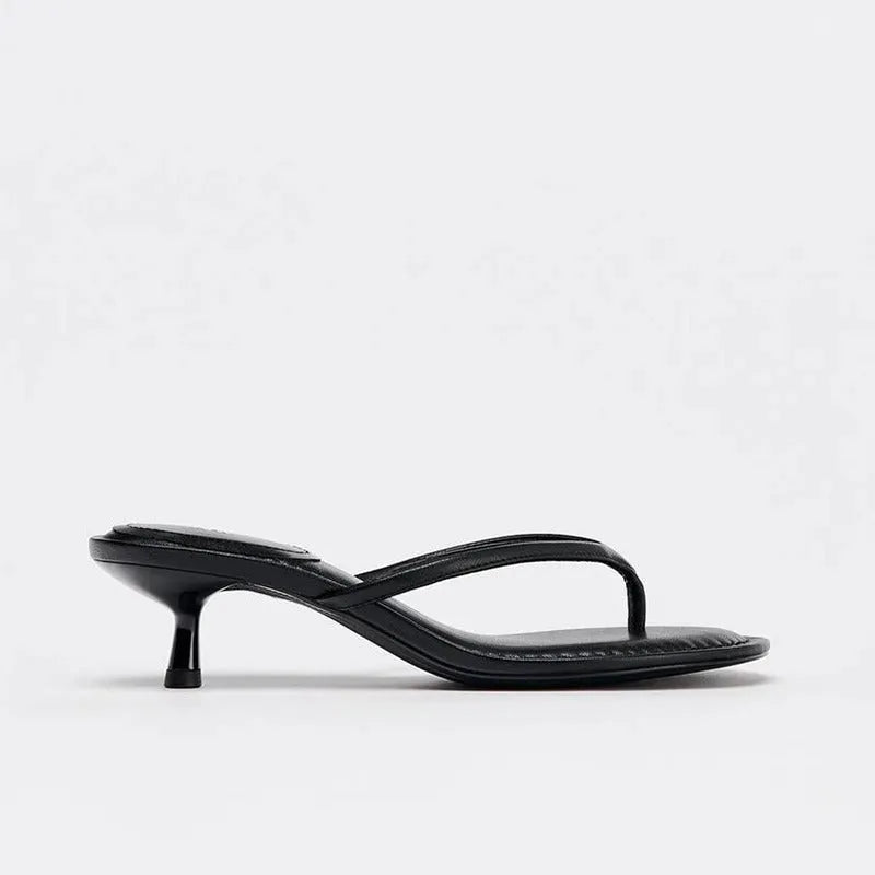 Women's khaki mid-heel flip-flop sandals with round toe and rubber sole on a plain background.