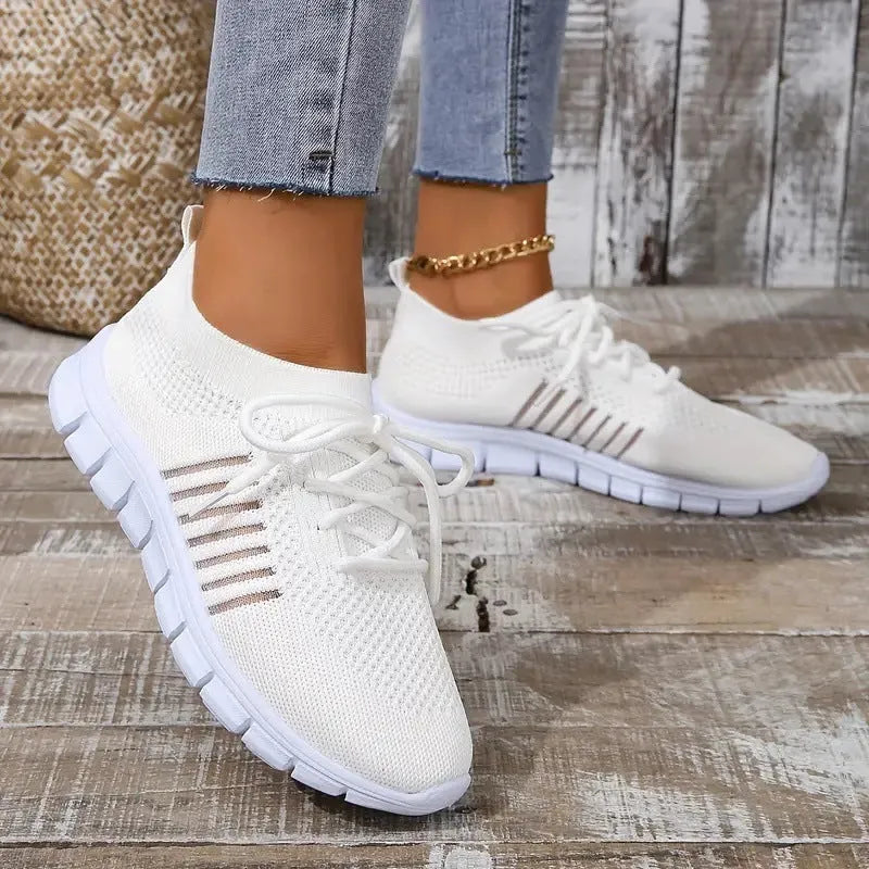 Women's casual flat shoes with breathable mesh knit upper and low EVA sole in multiple colour options
