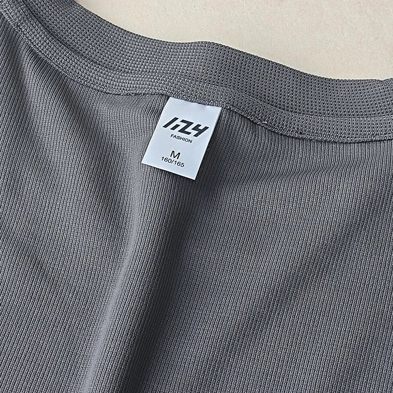 Men's heavyweight waffle-knit short-sleeve t-shirt in a solid colour on a size chart background.