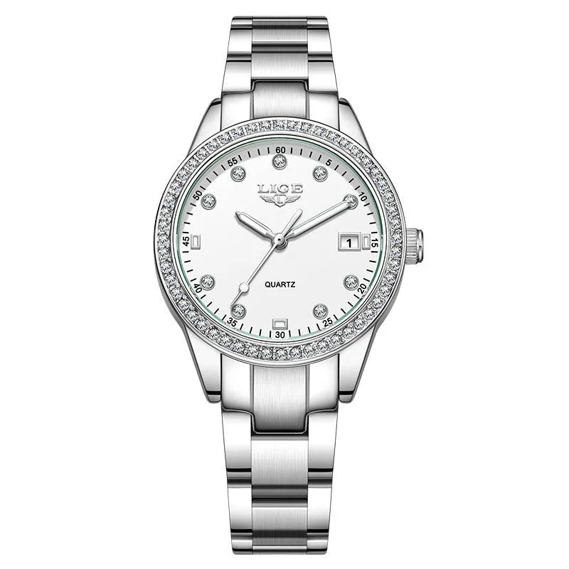 Women's silver fashion watch with diamond bezel, round white dial, luminous hands, and stainless steel bracelet.