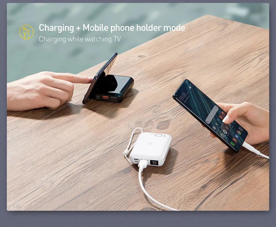 Small square black 10000mAh power bank with wireless charging symbol and digital display.