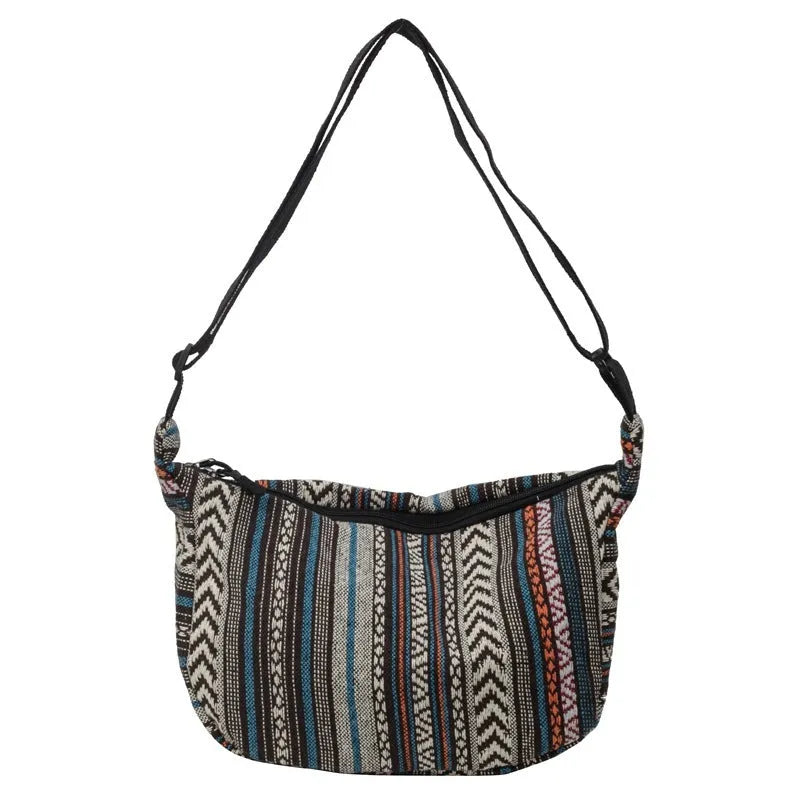 Women's ethnic style canvas dumpling crossbody bag showing sewing thread details and large capacity design