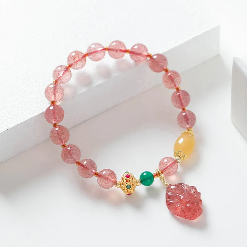 Women's crystal bracelet with polished strawberry quartz beads in nine tail fox colour design