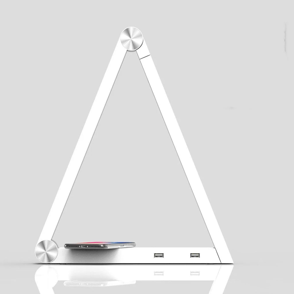 LED triangle table lamp with wireless charging pad and touch dimming controls in black