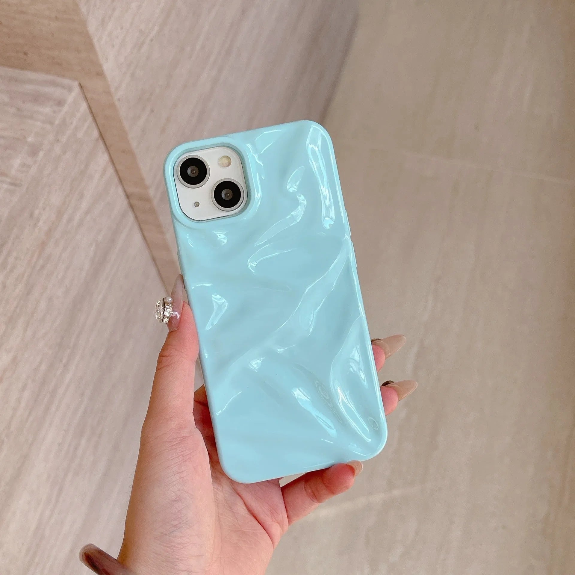 Electroplated three-dimensional pleated TPU phone case for iPhone 11–16 Pro Max in milk blue colour