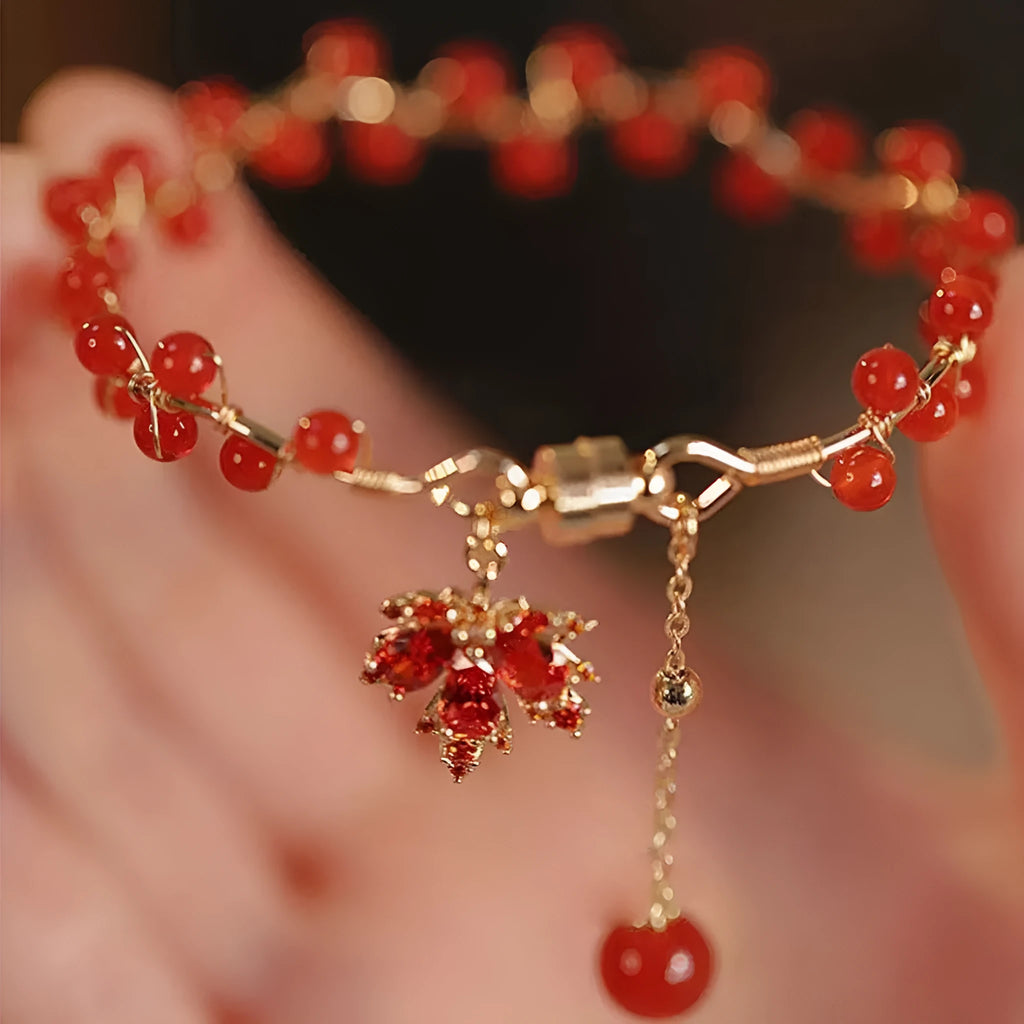 Red ginkgo leaf magnetic bracelet with electroplated alloy finish and adjustable sizing