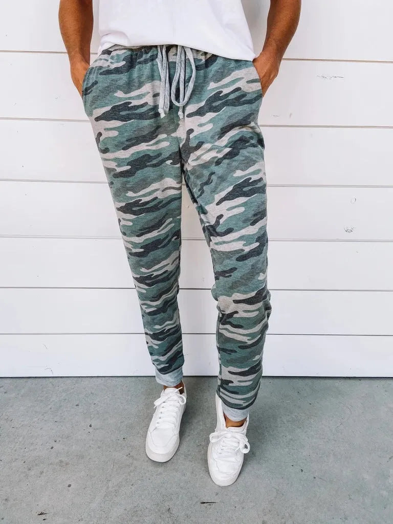 Women's polyester pencil leggings with leopard print irregular colour-block pattern, mid-rise elastic waist