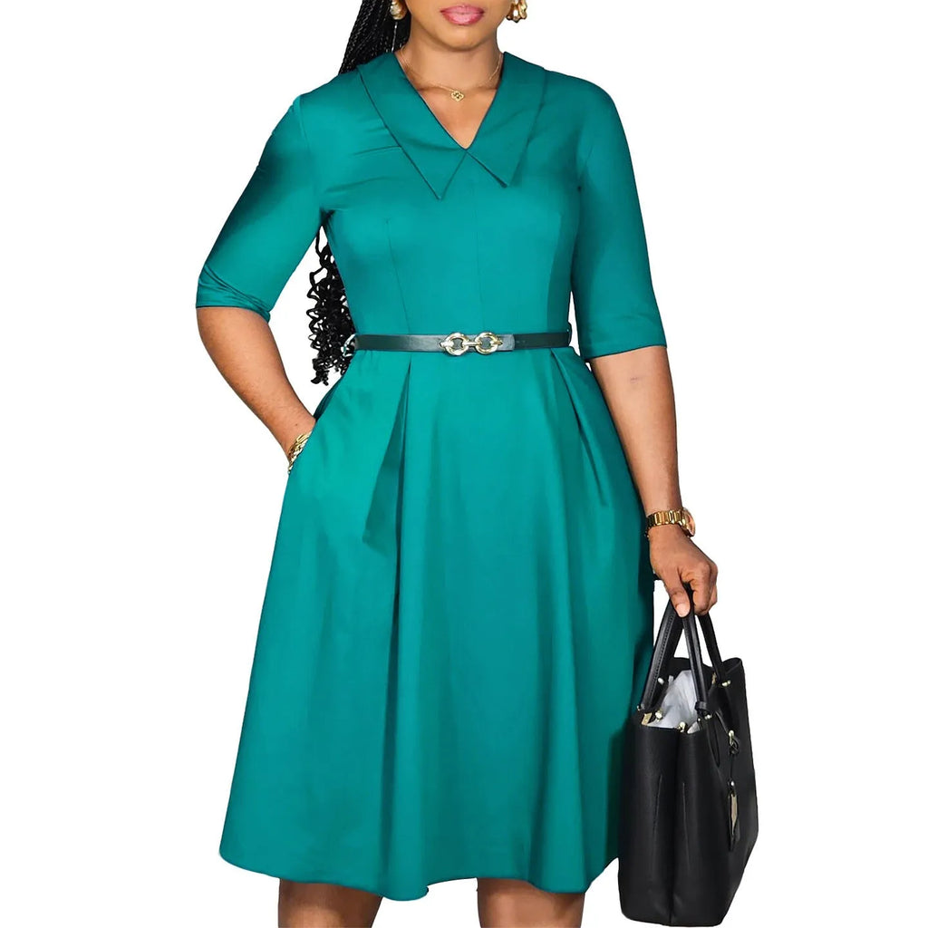 Women's solid colour African dress with half sleeves and a matching detachable belt.