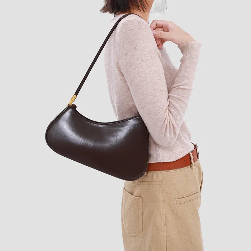 Women's oval retro underarm bag in PU leather with single shoulder strap and zipped compartment
