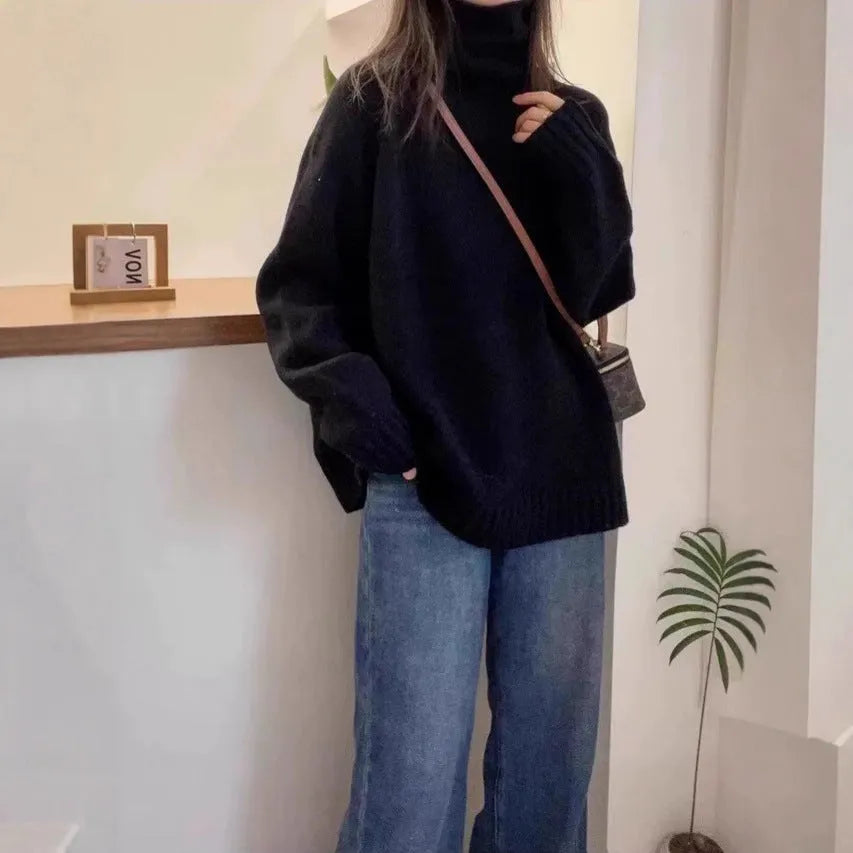 Loose red women's turtleneck sweater with thick curling collar, casual idle style.