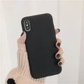 Flexible silicone phone case for iPhone shown in a choice of eight colours including wine red and rose gold.