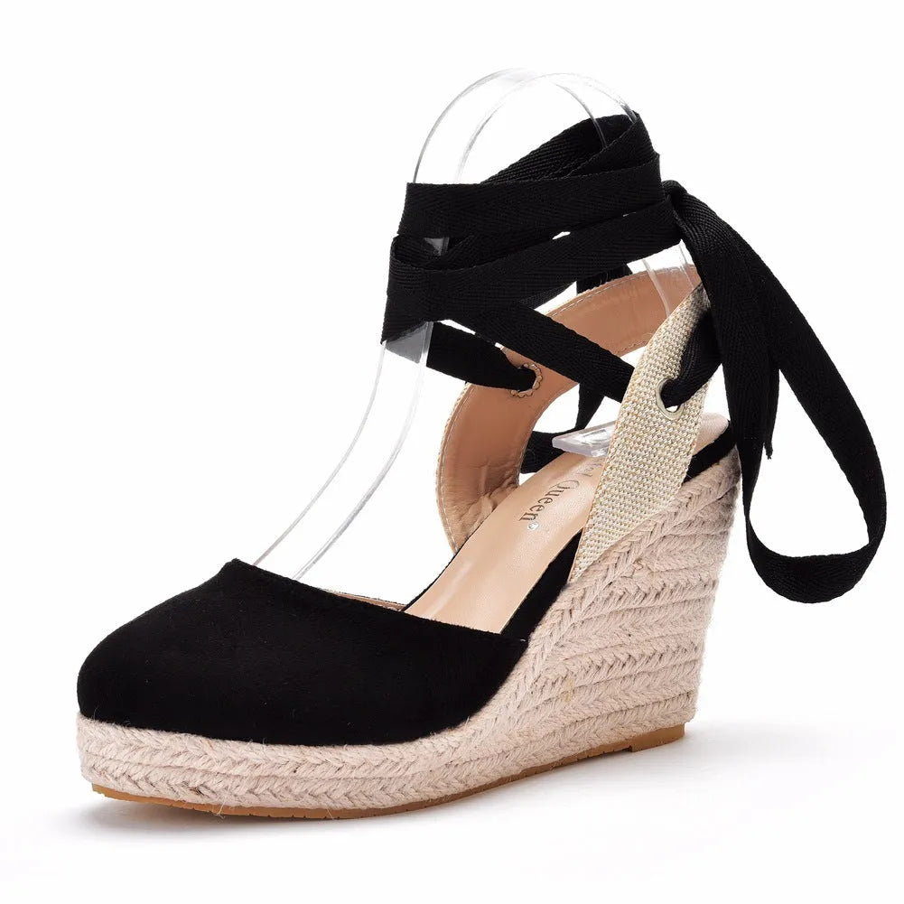 Women's apricot wedge platform sandals with bead details and a buckle strap on a white background.