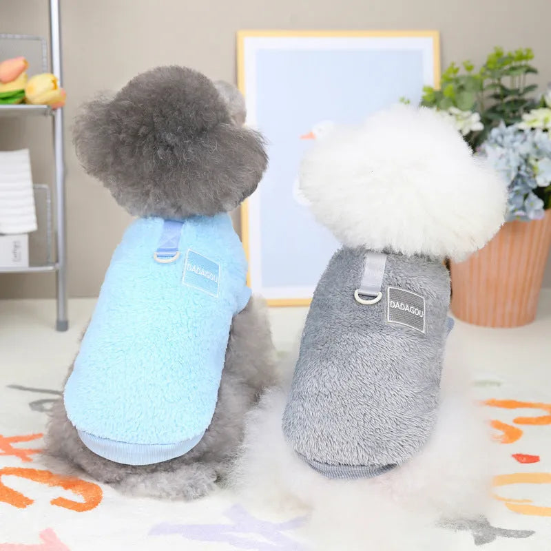A blue coral fleece jacket for a dog or cat with a pull ring fastening, shown in size M.