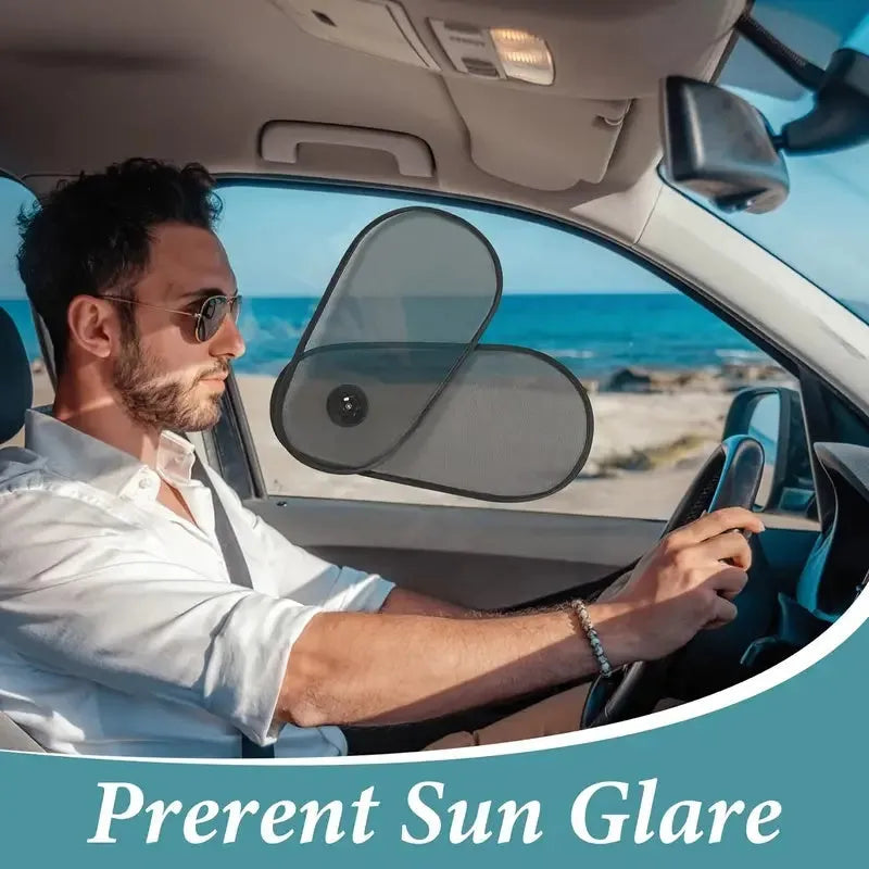 Black breathable mesh car sun shade stretched over a car side window, showing suction cups.