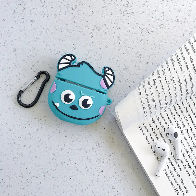 Green silicone AirPods 1/2 generation case with a cartoon animal design on a table.