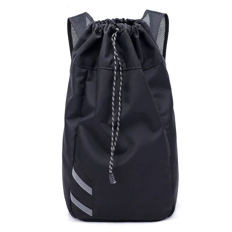 Black nylon backpack gym bag, 30 x 17 x 56cm, with zip pocket and three carry modes