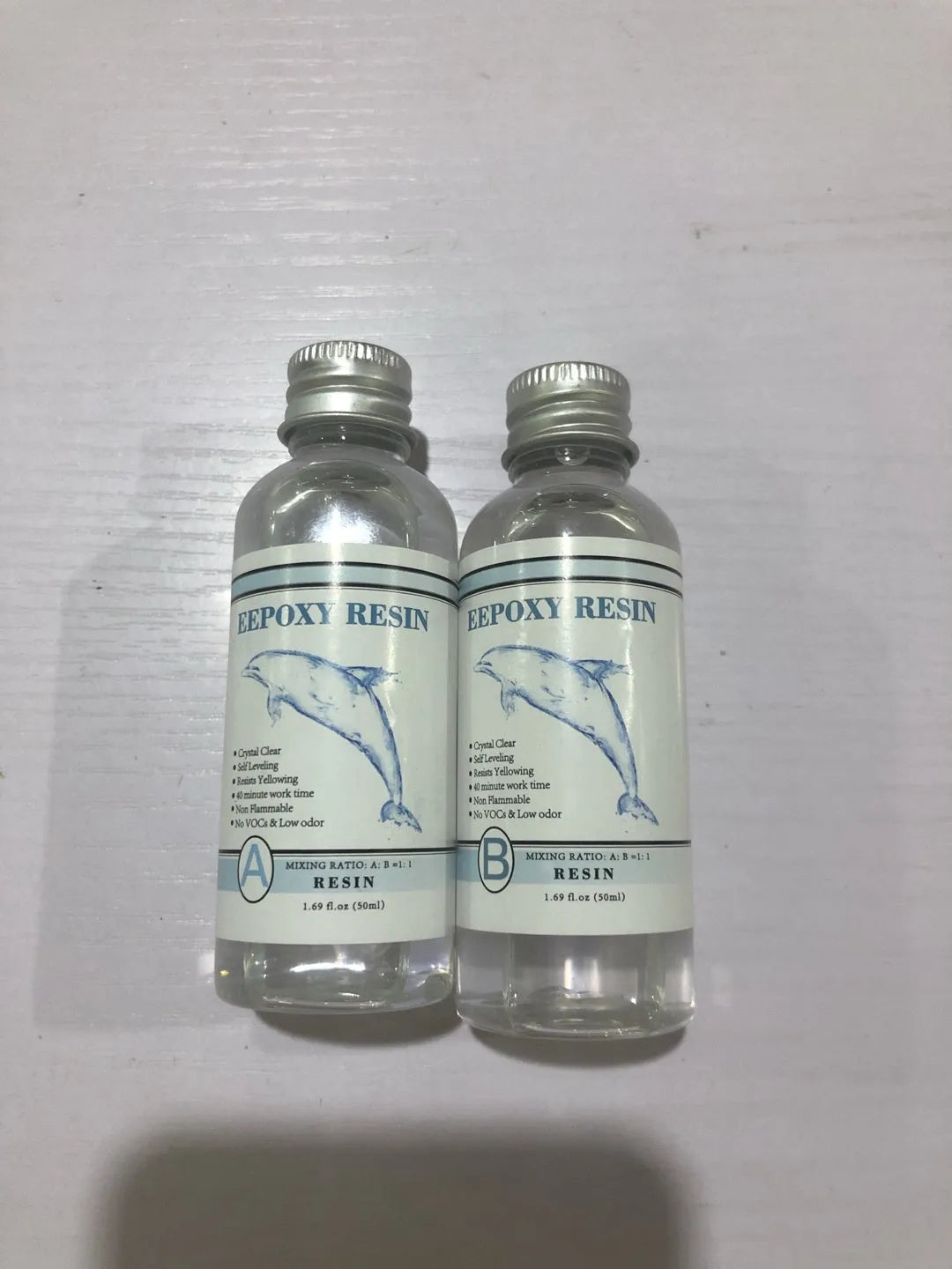 Quick curing clear AB epoxy resin bottles for DIY jewellery and craft projects.