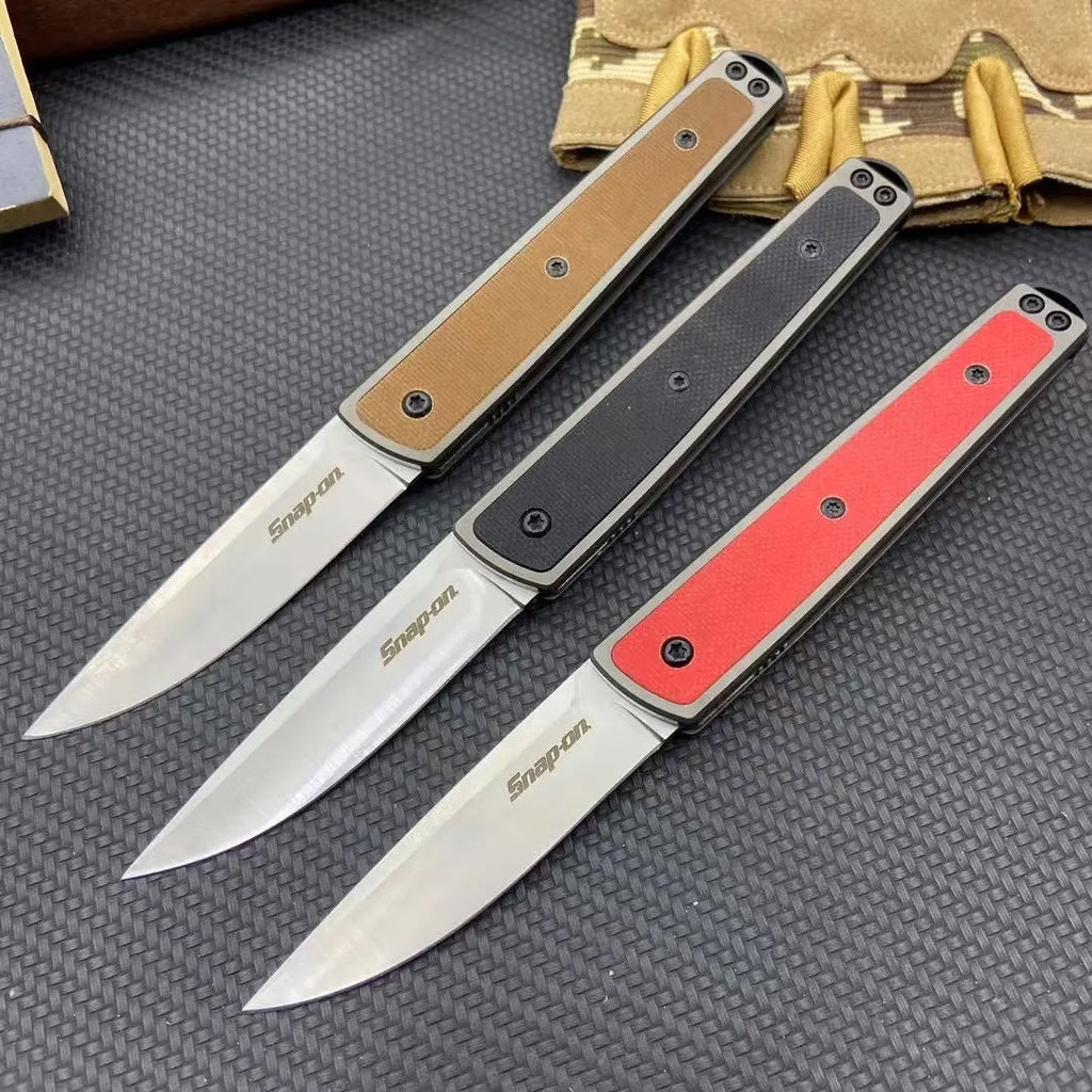 Folding fruit knife with stainless steel blade in black, coffee, or red colour options showing extended and closed positions