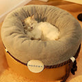Closed solid colour warm cat nest in warm yellow, made from polyester PU cotton, available in small and medium sizes